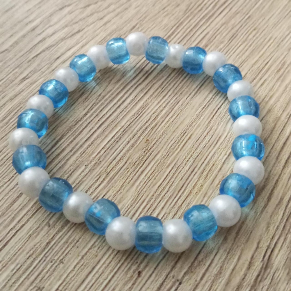 New Pastel baby blue hue and pearl beaded stretch summer statement bracelet